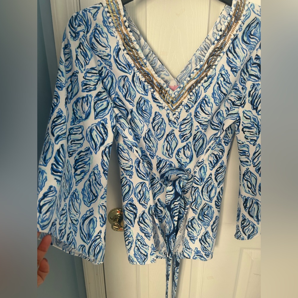 Lilly Pulitzer V neck Top blue shells print with gold beaded detail.
